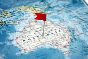 Map of Australia with a small red flag pinned in the middle
